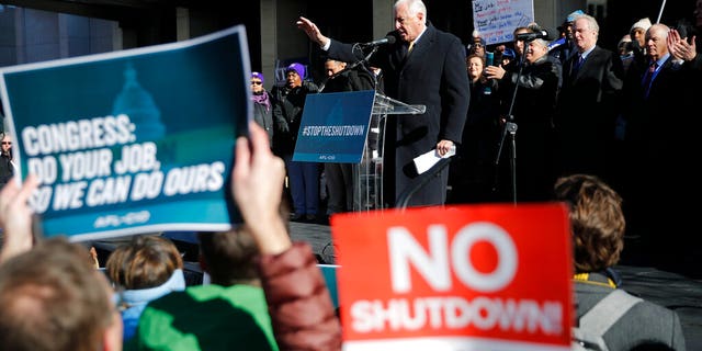House Majority Leader Rep. Steny Hoyer, D-Md., center on stage, gestures while speaking to union members and other federal employees at a rally to call for an end to the partial government shutdown, Thursday, Jan. 10, 2019, at AFL-CIO Headquarters in Washington. (AP Photo/Pablo Martinez Monsivais)