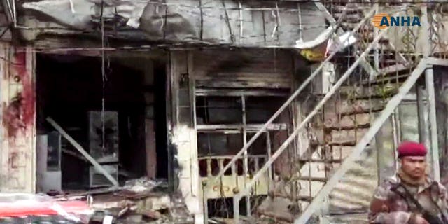 This frame grab from video provided by Hawar News, ANHA, the news agency for the semi-autonomous Kurdish areas in Syria, shows a damaged restaurant where an explosion occurred, in Manbij, Syria, Wednesday, Jan. 16, 2019. The Britain-based Syrian Observatory for Human Rights, a Syrian war monitoring group, and a local town council said Wednesday that the explosion took place near a patrol of the U.S.-led coalition and that there are casualties. (ANHA via AP)