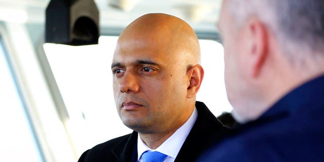 Britain's Home Secretary Sajid Javid, meets Border Force staff on board HMC Searcher, in Dover, England, Wednesday, Jan. 2, 2019. (Gareth Fuller/PA via AP)