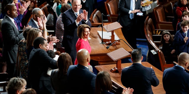 House Democratic Leader Nancy Pelosi of California, who is expected to lead the 116th Congress as speaker of the House, is applauded at the Capitol in Washington, Thursday, Jan. 3, 2019. (AP Photo/Carolyn Kaster)