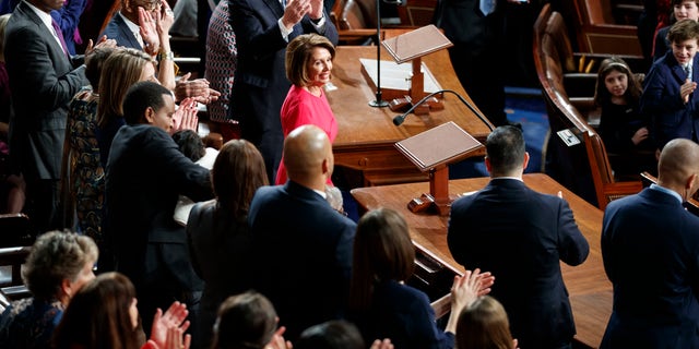 House Democratic Leader Nancy Pelosi of California, who is expected to lead the 116th Congress as speaker of the House, is applauded at the Capitol in Washington, Thursday, Jan. 3, 2019. (AP Photo/Carolyn Kaster)