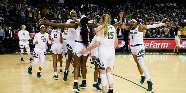 Baylor players celebrate after a 68-57 victory over No. 1 Connecticut in an NCAA college basketball game Thursday, Jan. 3, 2019, in Waco, Texas. (AP Photo/Ray Carlin)
