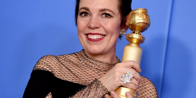 Olivia Colman poses in the press room with the award for best performance by an actress in a motion picture, musical or comedy for "The Favourite" at the 76th annual Golden Globe Awards at the Beverly Hilton Hotel on Sunday, Jan. 6, 2019, in Beverly Hills, Calif. (Photo by Jordan Strauss/Invision/AP)