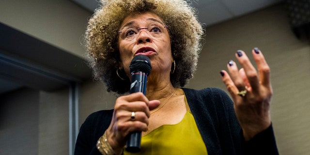 Angela Davis, author, educator and iconic civil rights activist, speaking in Michigan.