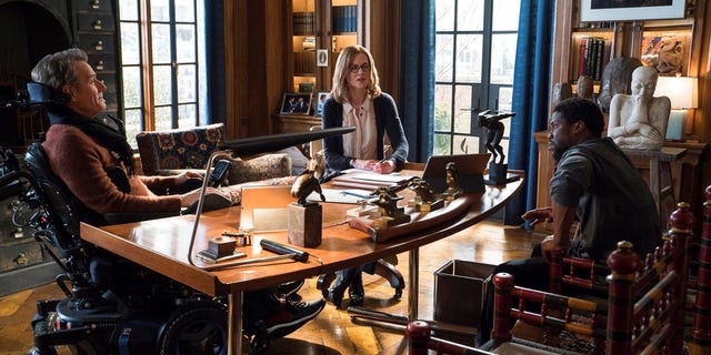 Bryan Cranston, from left, Nicole Kidman and Kevin Hart in a scene from "The Upside."