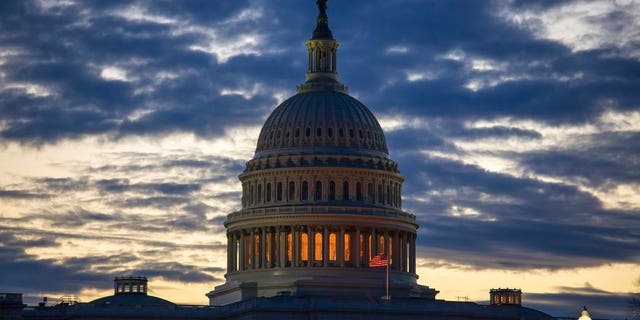 Dawn arrives at the Capitol in Washington, as the partial government shutdown enters day 18, Tuesday, Jan. 8, 2019, as President Donald Trump holds to his border wall funding demands. Trump will speak to the nation tonight about the border in a televised address from the Oval Office. (AP Photo/J. Scott Applewhite)