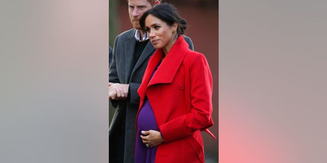 Meghan, the Duchess of Sussex and Britain's Prince Harry visit a new sculpture in Hamilton Square to mark the 100th anniversary of war poet Wilfred Owen's death, during a visit to Birkenhead, England.