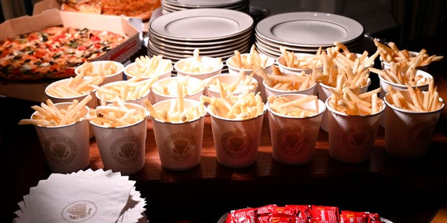 French fries and pizza are some of the fast food items for the reception for the Clemson Tigers in the State Dining Room of the White House in Washington, Monday, Jan. 14, 2019.