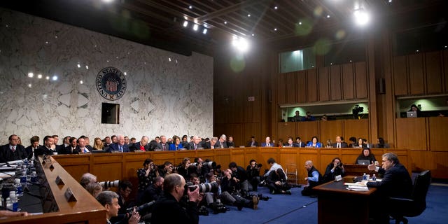 Attorney General nominee William Barr, right, testifies during a Senate Judiciary Committee hearing on Capitol Hill in Washington, Tuesday, Jan. 15, 2019. Barr will face questions from the Senate Judiciary Committee on Tuesday about his relationship with Trump, his views on executive powers and whether he can fairly oversee the special counsel's Russia investigation. Barr served as attorney general under George H.W. Bush. (AP Photo/Andrew Harnik)