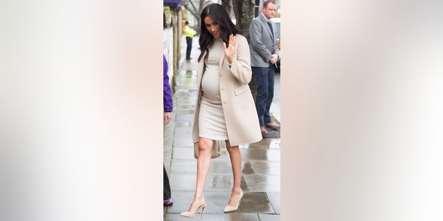 Meghan The Duchess of Sussex arrives at the Mayhew animal welfare charity on Wednesday Jan. 16, 2019, to meet with volunteers to hear about welfare initiatives, community engagement and international projects carried out by the charity. This is Her Royal Highness's first official visit to Mayhew in her new role as Patron of the charity. (Eddie Mulholland/pool via AP)