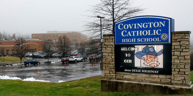 A diocese in Kentucky apologized Saturday after videos emerged showing students from Covington Catholic High School mocking Native Americans outside the Lincoln Memorial on Friday after a rally in Washington. (AP Photo/Bryan Woolston)