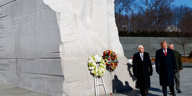 President Trump, Vice President Pence and Acting Interior Secretary David Bernhardt visiting the Martin Luther King Jr. Memorial on Monday in Washington. (AP Photo/ Evan Vucci)