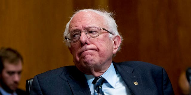 FILE - In this Jan. 16, 2019, photo, Sen. Bernie Sanders, I-Vt., reacts during a hearing on Capitol Hill in Washington. “Medicare-for-all” makes a good first impression, but support plunges when people are asked if they’d pay higher taxes or put up with treatment delays to get it. AP