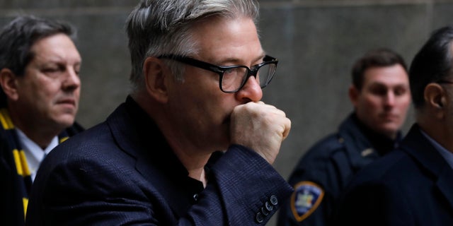 Actor Alec Baldwin leaves a New York City court, Wednesday, Jan. 23, 2019, after a hearing on charges that he slugged a man during a dispute over a parking spot last fall.