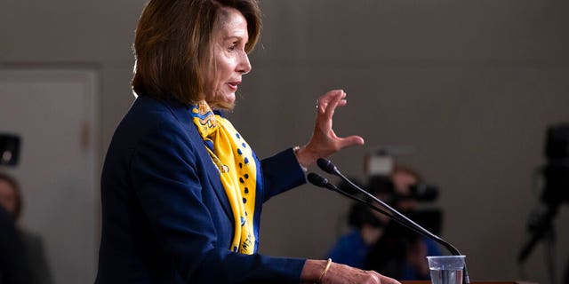 Speaker of the House Nancy Pelosi, D-Calif., talks to reporters a day after officially postponing President Donald Trump's State of the Union address until the government is fully reopened, at the Capitol on Thursday. (AP Photo/J. Scott Applewhite)