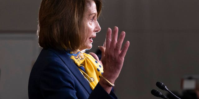 Speaker of the House Nancy Pelosi, D-Calif., talks to reporters a day after officially postponing President Donald Trump's State of the Union address until the government is fully reopened, at the Capitol in Washington, Thursday, Jan. 24, 2019. (AP Photo/J. Scott Applewhite)