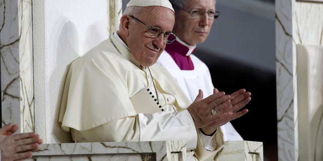 Hundreds of thousands of people camped out overnight in the Campo San Juan Pablo II following a Saturday evening mass, eagerly awaiting the pope's arrival early on Sunday morning