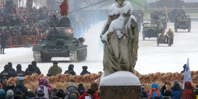 A Soviet World War II T-34 tank drives during a military parade at Dvortsovaya (Palace) Square during the celebration of the 75th anniversary of the end of the Siege of Leningrad during World War II in St.Petersburg, Russia, Sunday, Jan. 27, 2019.