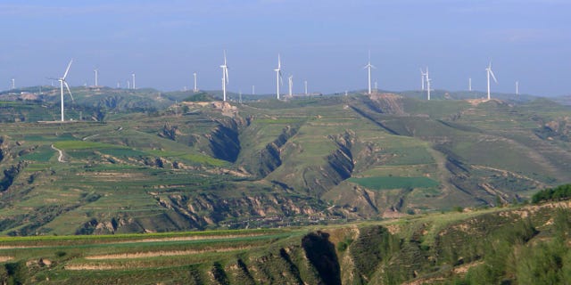 Wind turbines generating electricity at a wind farm in Xinzhou, China, in 2012. Chinese turbine manufacturer Sinovel was hit with the maximum penalty in 2018 after being found guilty of stealing plans from American Superconductor, a U.S. business that was forced to lay off hundreds of employees as a result.