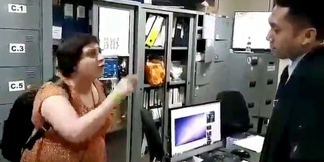 A video that was posted online shows Auj-e Taqaddas, 43, appearing to strike and swear at him when he asked her to pay a hefty fine for overstaying her visa. The video was widely circulated on social media shortly after the 2018 incident.