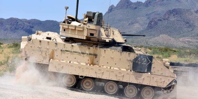 File photo - An M2A3 Bradley Fighting Vehicle crew changes position on the range during gunnery training at the Dona Ana Range Complex, N.M., Aug. 3, 2018. (Photo Credit: U.S. Army photo by Winifred Brown)