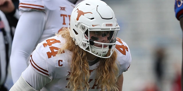 Texas Longhorns defensive lineman Breckyn Hager (44) before the snap during the first half of a Big 12 football game between the Texas Longhorns and Kansas Jayhawks on November 23, 2018 at Memorial Stadium in Lawrence, KS.