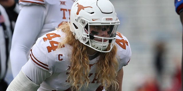 Texas Longhorns defensive lineman Breckyn Hager (44) before the snap during the first half of a Big 12 football game between the Texas Longhorns and Kansas Jayhawks on November 23, 2018 at Memorial Stadium in Lawrence, KS.
