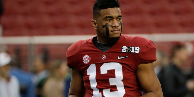 Alabama quarterback Tua Tagovailoa warms up before the NCAA college football playoff championship game against Clemson, Monday, Jan. 7, 2019, in Santa Clara, Calif.