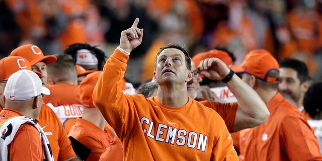 Clemson head coach Dabo Swinney celebrates in the final seconds of the NCAA college football playoff championship game against Alabama, Monday, Jan. 7, 2019, in Santa Clara, Calif. (AP Photo/David J. Phillip)