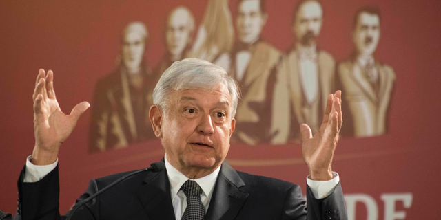 FILE - In this Dec. 3, 2018 file photo, Mexico's President Andres Manuel Lopez Obrador holds his first news conference as president, which started at 7 a.m. local time in Mexico City. Lopez Obrador has published a financial disclosure form on Thursday, Jan. 3, 2019, that reveals relatively few possessions and the fact that his wife makes more than he does. (AP Photo/Christian Palma, File)