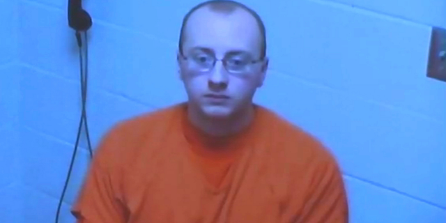 Jake Thomas Patterson, 21, makes his initial court appearance via video feed from the Barron County jail during his bond hearing in Barron, Wis.