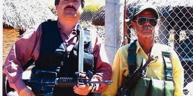 In this undated photo, Joaquin "El Chapo" Guzman, left, poses with an unidentified man.