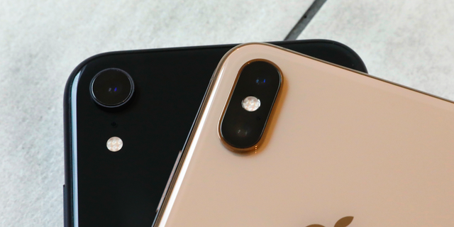 This archival photo of October 22, 2018 shows the iPhone XR, left, with only one lens, and the iPhone XS Max dual lens, in New York.