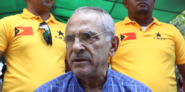 FILE - In this Saturday, April 14, 2018, file photo, Nobel peace prize laureate, and former East Timorese President Jose Ramos-Horta talks to journalists in Dili, East Timor. Horta has urged the Indonesian government to hold talks with the Papuan independence movement to help end a decades-long insurgency in the country's easternmost region. (AP Photo/Kandhi Barnez, File)