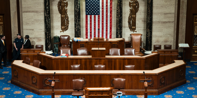 The chamber of the House of Representatives is seen before convening for the first day of the 116th Congress with Democrats holding the majority, at the Capitol in Washington, Thursday, Jan. 3, 2019. (AP Photo/J. Scott Applewhite)