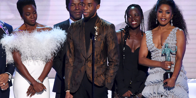 Danai Gurira, Isaach de Bankole, Chadwick Boseman, Lupita Nyong'o and Angela Bassett from the cast of "Black Panther" accept the award for outstanding performance by a cast in a motion picture at the 25th annual Screen Actors Guild Awards at the Shrine Auditorium & Expo Hall on Sunday, Jan. 27, 2019, in Los Angeles