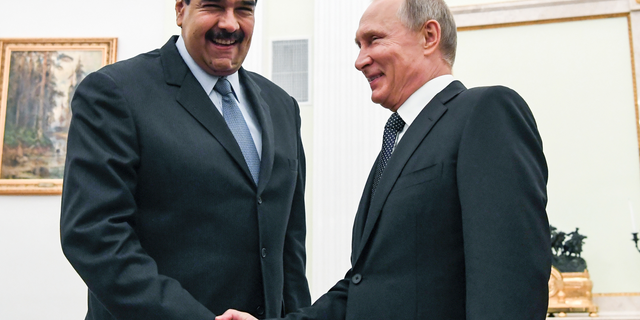 Vladimir Putin and Nicolas Maduro in 2017. (Yuri Kadobnov/Pool Photo via AP, File)