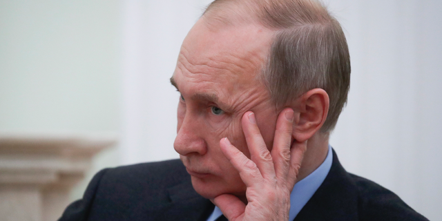 (Maxim Shemetov/Pool Photo via AP)