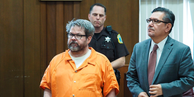 FILE - In this April 20, 2017 file photo, defendant Jason Dalton, left, who is charged with killing six people in-between picking up riders for Uber, stands with attorney Eusebio Solis during a hearing in Kalamazoo, Mich. Jury selection will begin on Jan. 3, 2019 after a prosecutor said he won't appeal a decision that keeps a lid on parts of a police interview. Kalamazoo County prosecutor Jeff Getting says it's time to bring the "matter to trial without further delay." The shootings occurred more than two years ago. (Mark Bugnaski/Kalamazoo Gazette-MLive Media Group via AP, File)