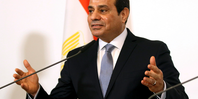 FILE - In this Dec. 17, 2018, file photo, Egyptian President Abdel-Fattah el-Sissi addresses the media during a joint press conference at the federal chancellery in Vienna, Austria. U.S. television network CBS says el-Sissi told it in an interview that his country and Israel, with whom it fought four wars, are cooperating against Islamic militants in the Sinai Peninsula. (AP Photo/Ronald Zak, File)