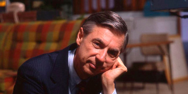 This image released by Focus Features shows Fred Rogers on the set of his show