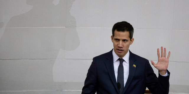 FILE - Venezuelan lawmaker Juan Guaido takes the oath of office as president of the National Assembly in Caracas, Venezuela. A coalition of Latin American governments that joined the U.S. in quickly recognizing Guaido as Venezuela’s interim president, and not Nicolas Maduro, came together during weeks of secret diplomacy. (AP Photo/Fernando Llano, File)