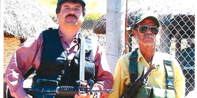 Joaquin "El Chapo" Guzman is seen holding a machine gun in this undated photo.