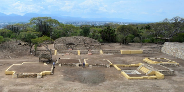 In this 2018 photo provided by Mexico's National Institute of Anthropology and History, INAH, investigators work at the Ndachjian - Tehuacan archaeological site in Tehuacan, Puebla state, Mexico, where archaeologist have identified the first known temple to the Flayed Lord, a pre-Hispanic fertility god depicted as a skinned human corpse. (Meliton Tapia Davila/INAH via AP)