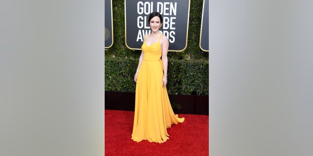 Rachel Brosnahan glows in a yellow number at the award show.