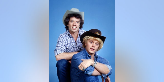 American actors Tom Wopat (left) and John Schneider in a promotional portrait for the TV show "The Dukes of Hazzard", circa 1980.
