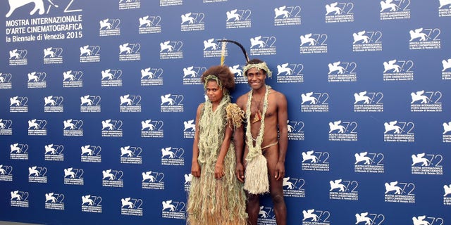 VENICE, ITALY - SEPTEMBER 08: (L-R) Marie Wawa and Mungau Dain attend a photocall for 'Tanna' during the 72nd Venice Film Festival at Palazzo del Casino on September 8, 2015 in Venice, Italy.