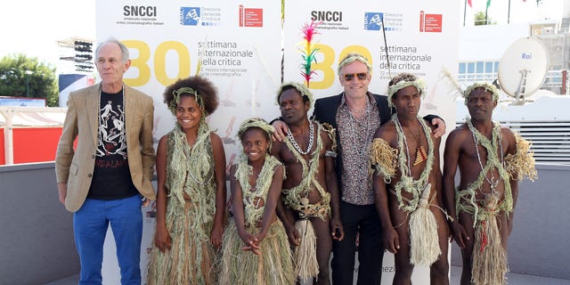 (L-R) Director Martin Butler, Marie Wawa, Marceline Rofit, Lingai Kowia, director Bentley Dean, Mungau Dain and Jimmy Jospeh Nako attend a photocall for 'Tanna' during the 72nd Venice Film Festival. It was reported that Dain has died.