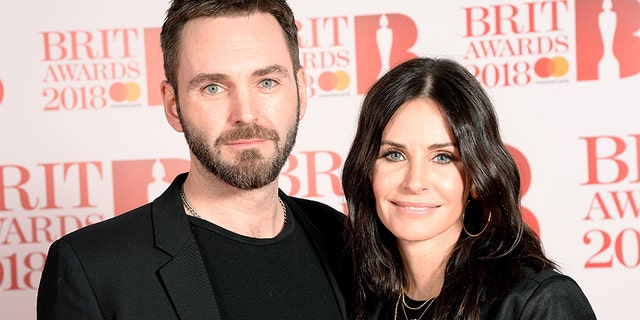 Johnny McDaid and Courteney Cox attend The BRIT Awards 2018 held at The O2 Arena on February 21, 2018 in London, England.