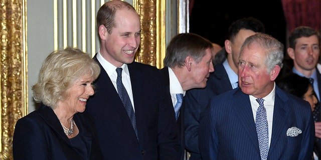 Camilla, Duchess of Cornwall, Prince William, Duke of Cambridge and Prince Charles, Prince of Wales attend the 2018 Commonwealth Day reception at Marlborough House on March 12, 2018 in London, England. — Getty